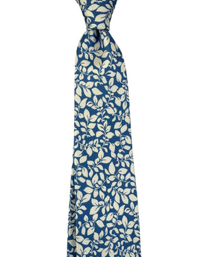 Blue tie with white leaf pattern on a white background