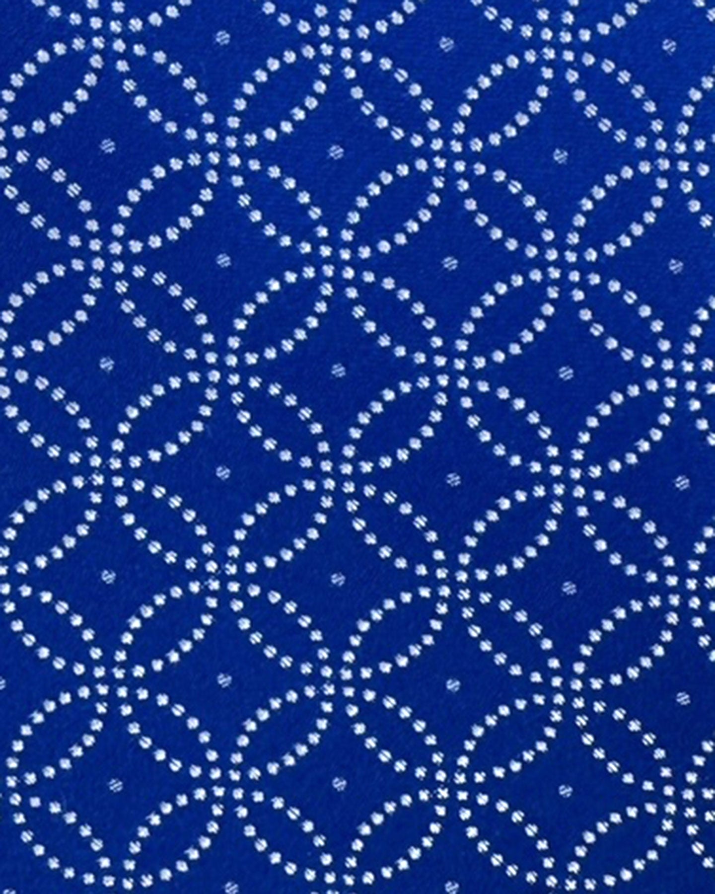 Blue tie with white geometric pattern on a white background